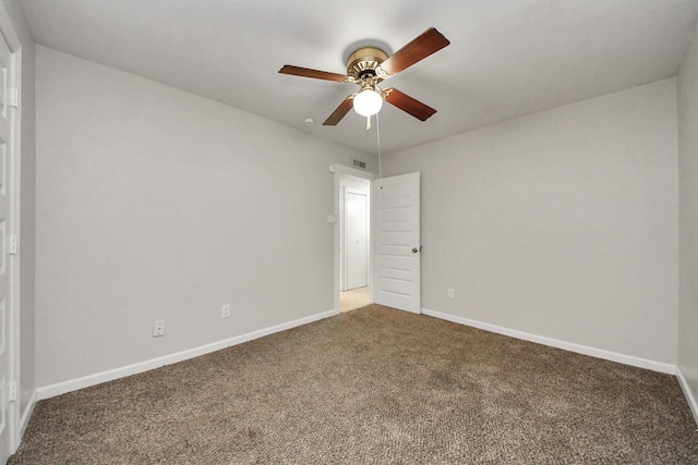 carpeted empty room with ceiling fan