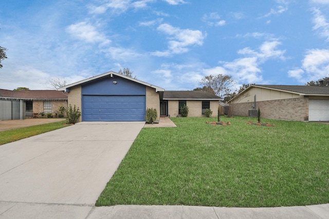 ranch-style house with a front yard, a garage, and central AC