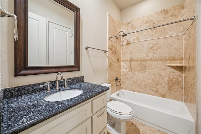 full bathroom featuring toilet, tiled shower / bath combo, and vanity