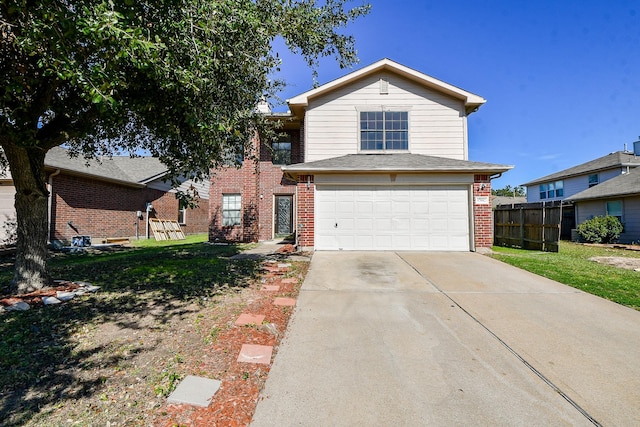 view of front facade with a front lawn and a garage