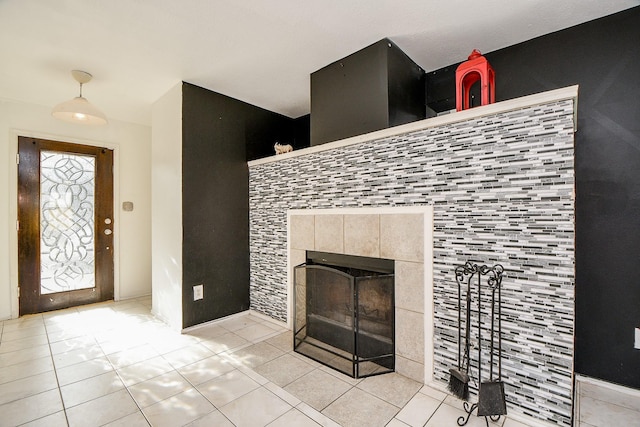 details with a tiled fireplace