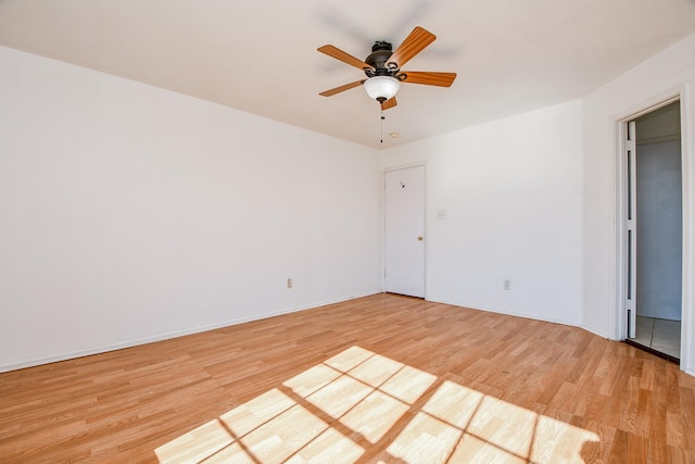 unfurnished bedroom featuring ceiling fan and light hardwood / wood-style flooring