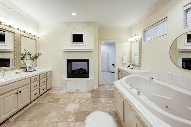 bathroom with a bathtub, a multi sided fireplace, crown molding, and vanity