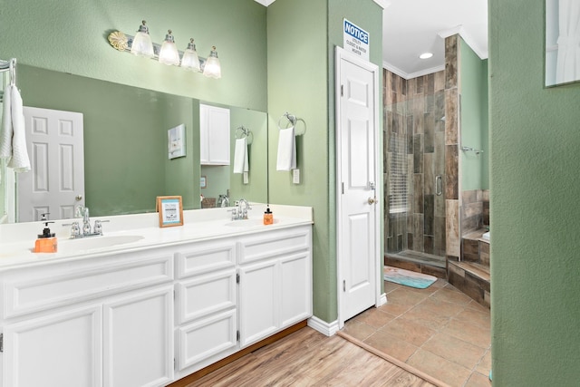 bathroom with vanity, tile patterned floors, and a shower with shower door