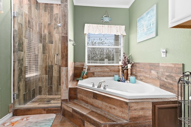 bathroom featuring ornamental molding, tile patterned flooring, and shower with separate bathtub