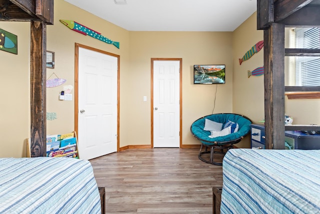 bedroom featuring hardwood / wood-style floors