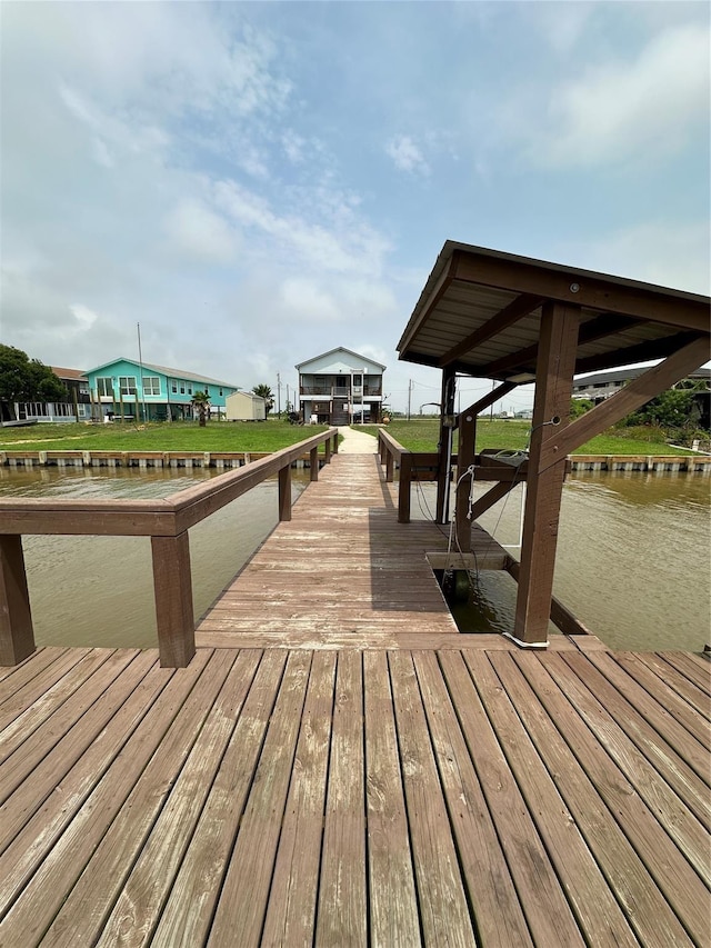 dock area with a water view