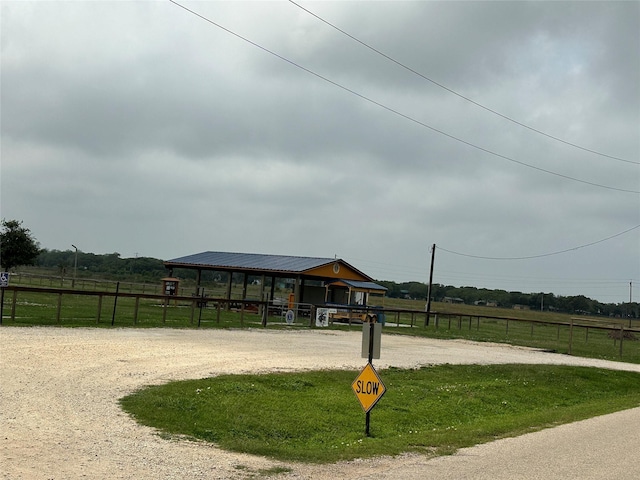 view of home's community featuring a rural view