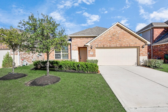 view of front facade featuring a garage and a front lawn