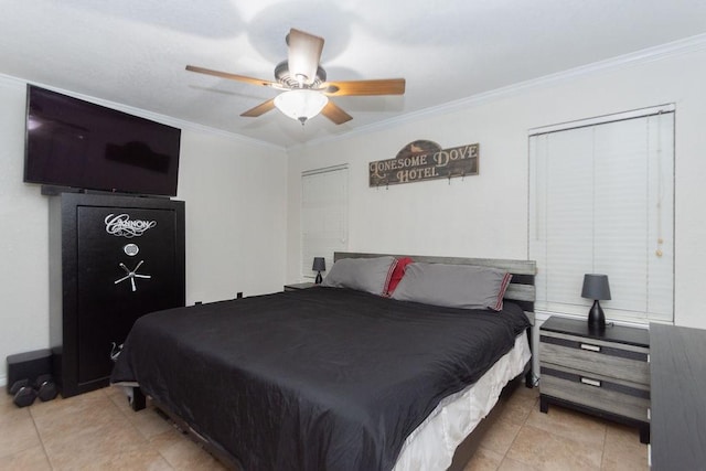 bedroom with ceiling fan, ornamental molding, and light tile patterned floors