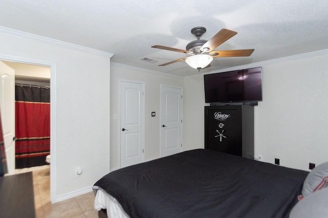 bedroom featuring a closet, ceiling fan, and crown molding