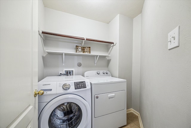 laundry area featuring separate washer and dryer