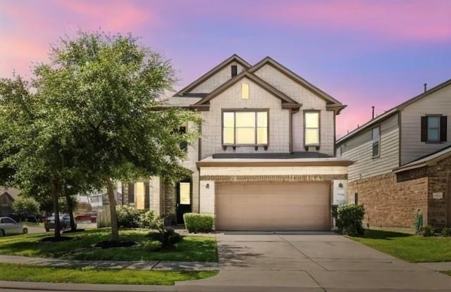 craftsman house with a garage