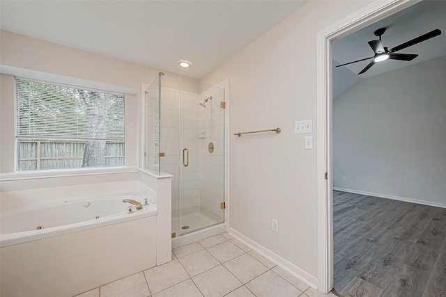 bathroom with tile patterned floors, ceiling fan, and separate shower and tub