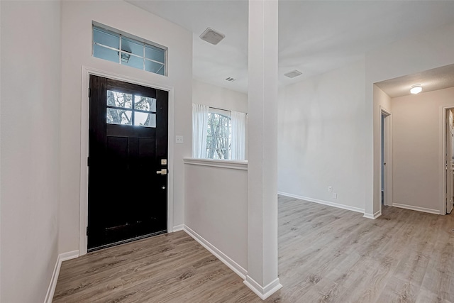 entrance foyer with light wood-type flooring