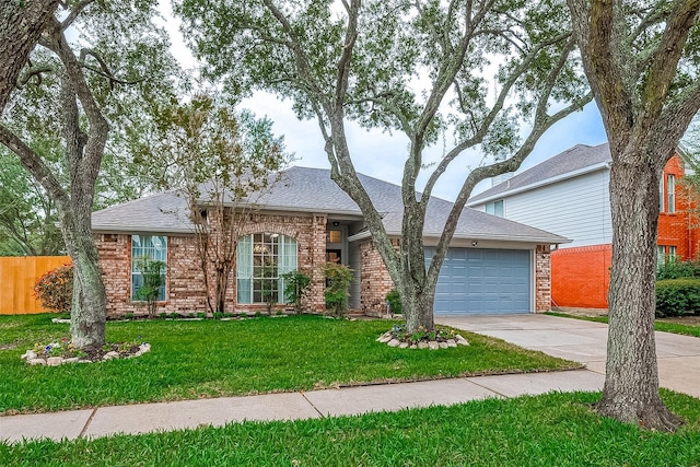 single story home with a garage and a front lawn