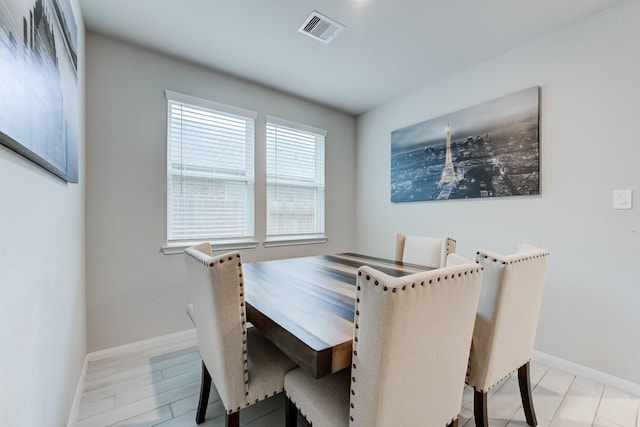 dining room featuring light hardwood / wood-style flooring