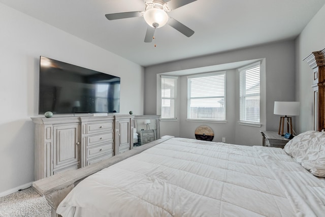 bedroom featuring ceiling fan and carpet flooring