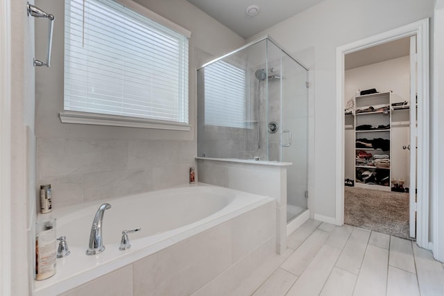 bathroom with independent shower and bath