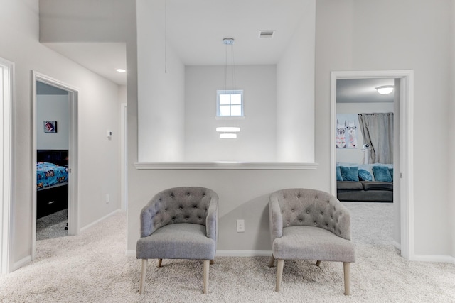 living area with carpet