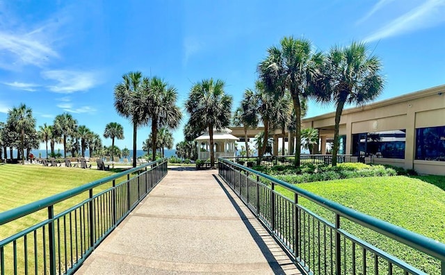 view of home's community with a lawn