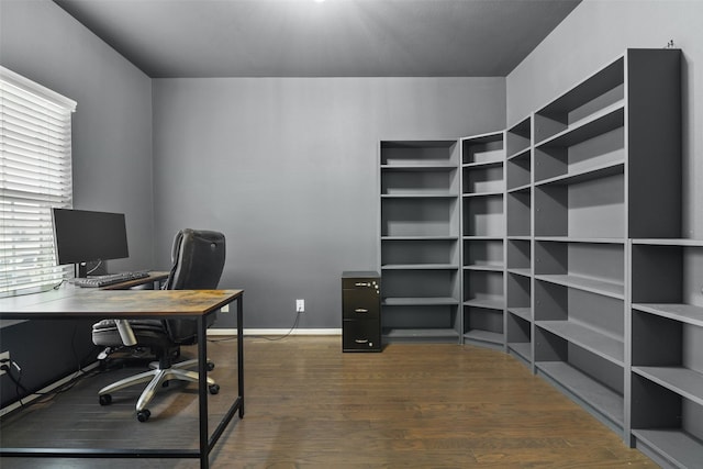 office area featuring dark wood-type flooring