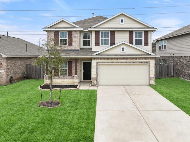 view of front of home with a front yard and a garage