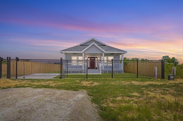 view of front of home with a yard