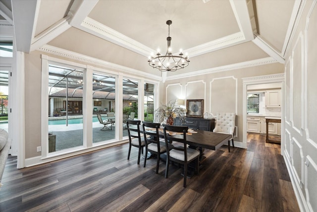 dining area with an inviting chandelier, crown molding, and dark hardwood / wood-style flooring