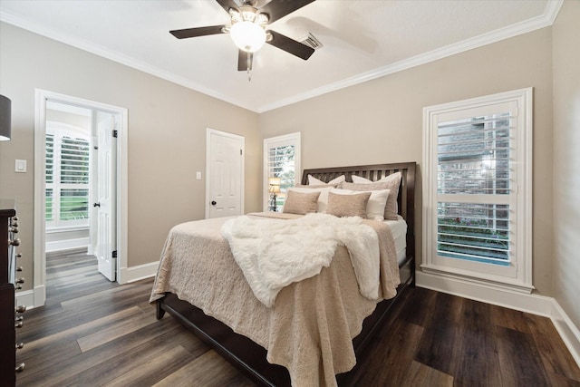 bedroom with dark wood-type flooring, ceiling fan, ornamental molding, and multiple windows