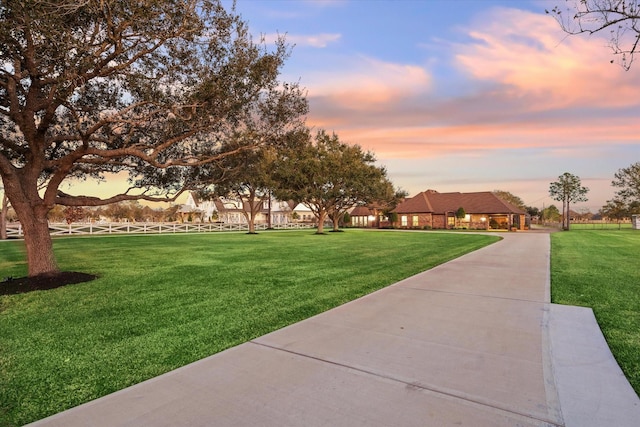 view of community featuring a yard