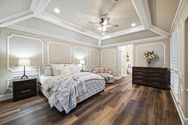 bedroom with dark hardwood / wood-style flooring, ceiling fan, and crown molding