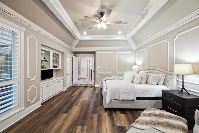 bedroom with lofted ceiling, ceiling fan, crown molding, and dark hardwood / wood-style floors