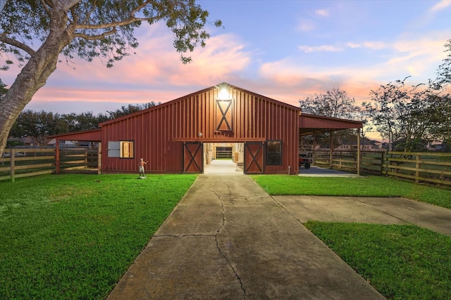 view of front of property featuring an outbuilding