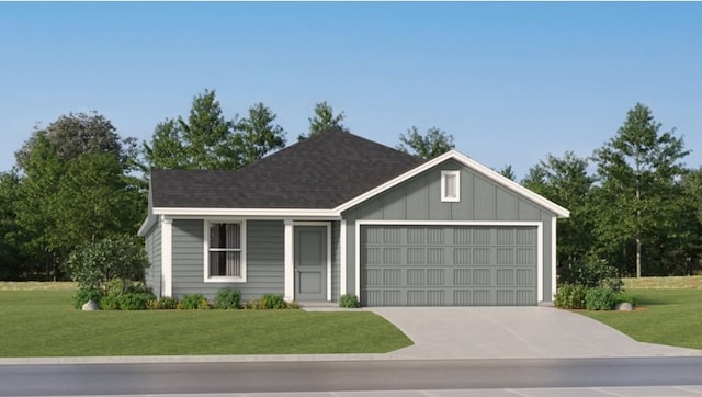 view of front of house with a garage and a front lawn