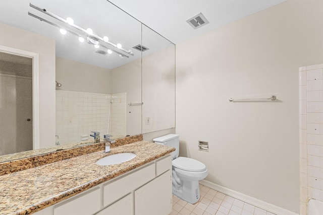 bathroom featuring tile patterned flooring, a shower, vanity, and toilet