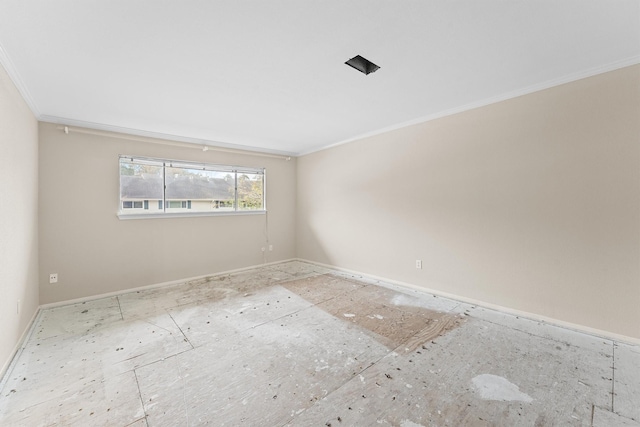 spare room with ornamental molding