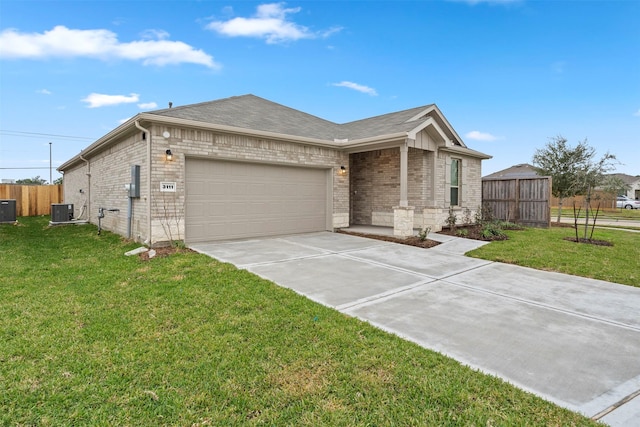 ranch-style house with a garage, cooling unit, and a front lawn