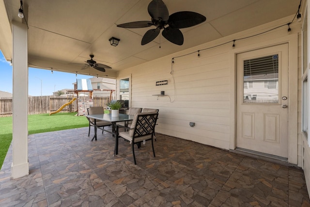 view of patio / terrace with a playground and ceiling fan