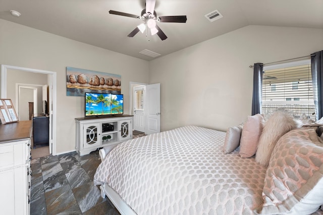 bedroom with ceiling fan and lofted ceiling