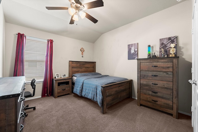 carpeted bedroom featuring ceiling fan and vaulted ceiling