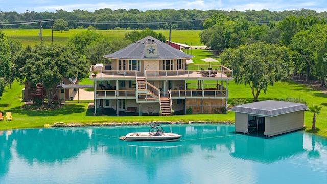 view of swimming pool featuring a wooden deck and a dock