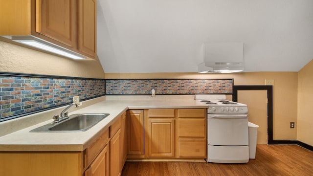 kitchen with sink, white electric range, and light hardwood / wood-style flooring