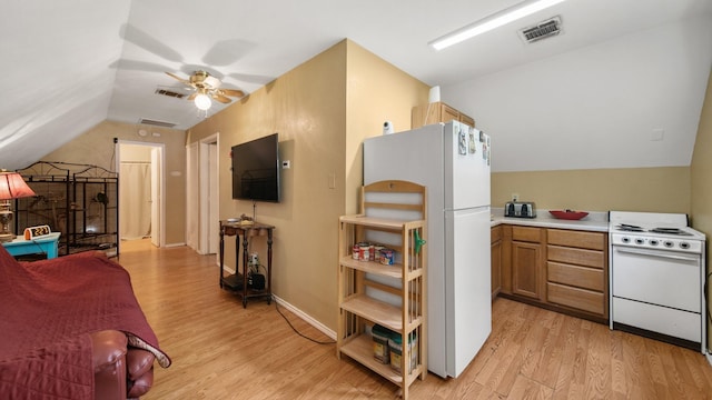 kitchen featuring ceiling fan, lofted ceiling, white appliances, and light hardwood / wood-style floors