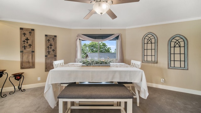 dining area featuring carpet floors, ornamental molding, and ceiling fan