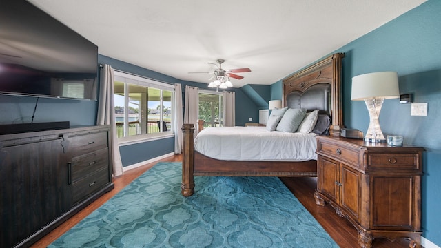 bedroom featuring dark hardwood / wood-style flooring and ceiling fan