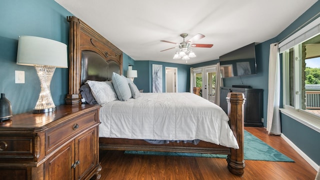 bedroom featuring ceiling fan, access to exterior, and multiple windows