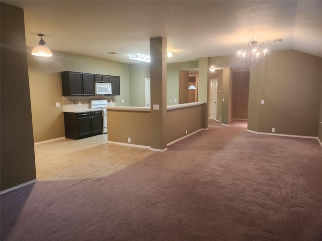 unfurnished living room featuring vaulted ceiling, light carpet, and an inviting chandelier