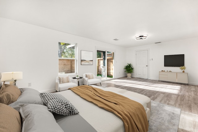 bedroom with light hardwood / wood-style flooring