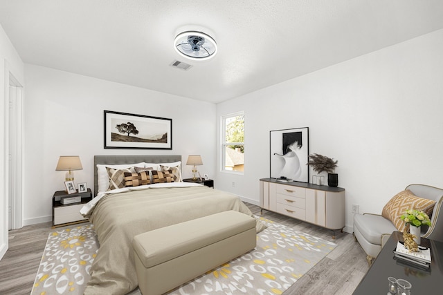 bedroom featuring light hardwood / wood-style floors